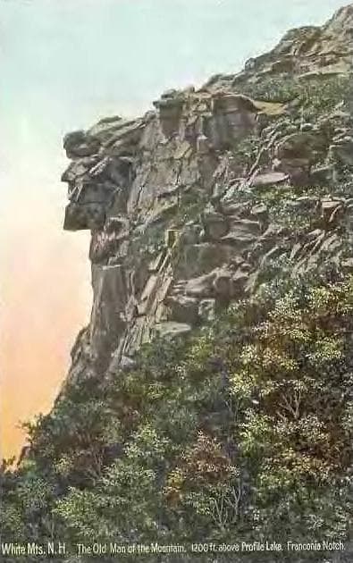 A colored postcard of the Old Man of the Mountain in Franconia Notch, New Hampshire, ca. 1910, with a caption strip reading White Mts., N.H. The Old Man of the Mountain. 1200 ft above Profile Lake. Franconia Notch.