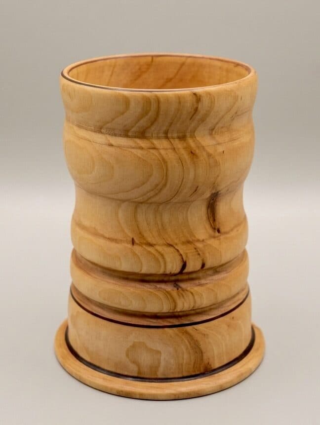 A waisted mug, the band turned to find a quieter line through the figure of the wood.